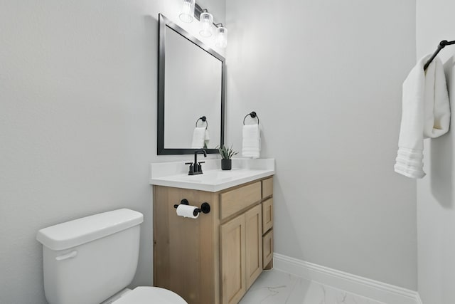 1808 Wren St, Argyle, TX 76226 - half bathroom with marble finish floors, vanity, baseboards, and toilet