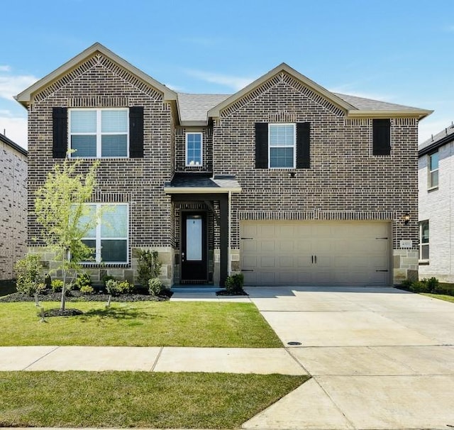 4321 Minnow Cove Rd, Oak Point, TX 75068 - view of front of house with brick siding, a front yard, driveway, and an attached garage