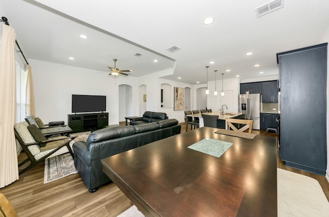4321 Minnow Cove Rd, Oak Point, TX 75068 - interior space with visible vents, arched walkways, light wood-style flooring, and recessed lighting