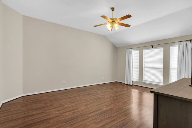 8405 Evening Star Dr, Rowlett, TX 75089 - empty room featuring vaulted ceiling, ceiling fan, dark wood-type flooring, and baseboards