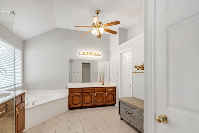 8405 Evening Star Dr, Rowlett, TX 75089 - full bath with a ceiling fan, vanity, vaulted ceiling, a bath, and tile patterned flooring