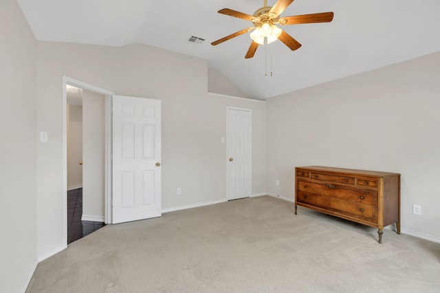 8405 Evening Star Dr, Rowlett, TX 75089 - unfurnished bedroom with lofted ceiling, light colored carpet, baseboards, and a ceiling fan