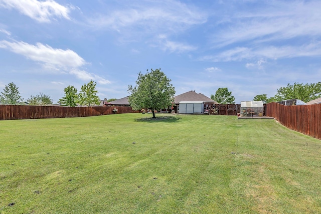 8405 Evening Star Dr, Rowlett, TX 75089 - view of yard featuring an outbuilding