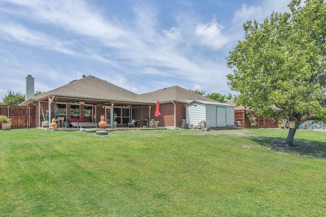 8405 Evening Star Dr, Rowlett, TX 75089 - rear view of property featuring brick siding, a chimney, and a patio