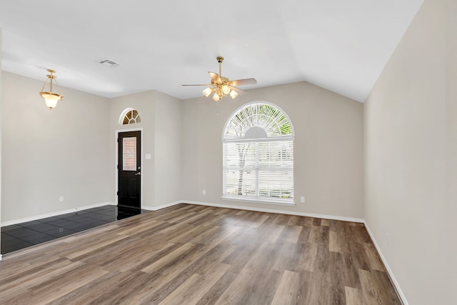 8405 Evening Star Dr, Rowlett, TX 75089 - entryway with wood finished floors, a ceiling fan, lofted ceiling, and baseboards