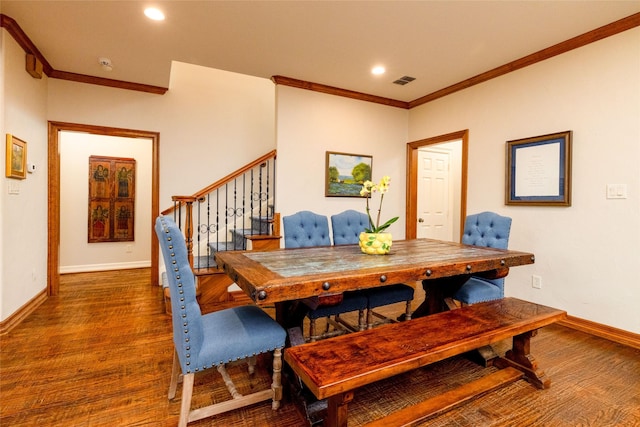 4113 Modlin Ave, Fort Worth, TX 76107 - dining room featuring crown molding, stairs, baseboards, and wood finished floors