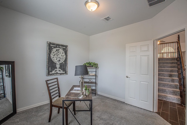 office space with carpet floors, visible vents, and baseboards