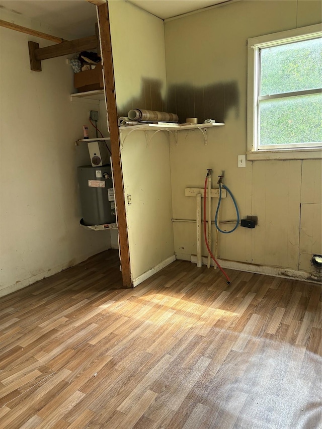 215 Fair Park St, Riesel, TX 76682 - laundry area featuring light wood-type flooring