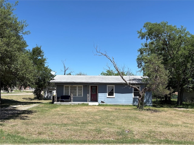 215 Fair Park St, Riesel, TX 76682 - view of front of property with a front lawn and a porch