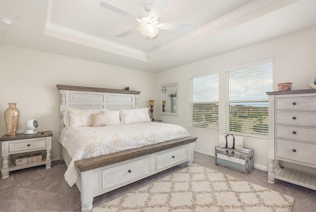 1728 Ackerly Dr, Forney, TX 75126 - bedroom featuring light carpet, a raised ceiling, ornamental molding, a ceiling fan, and baseboards