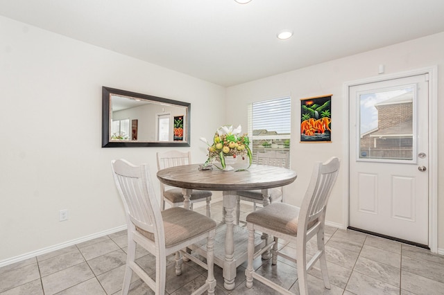 dining area with recessed lighting and baseboards
