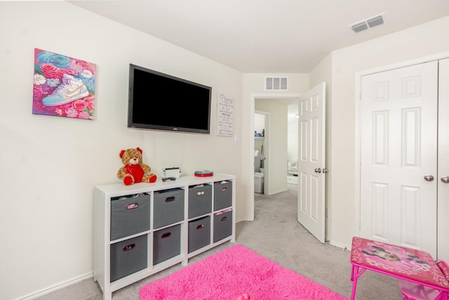 playroom with light carpet, baseboards, and visible vents