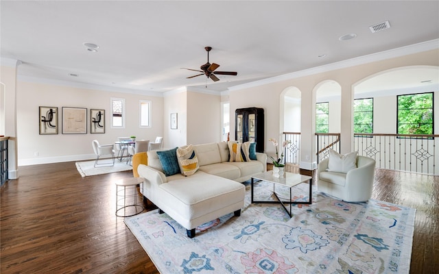 6511 Mimosa Ln, Dallas, TX 75230 - living area featuring plenty of natural light, ceiling fan, dark wood-type flooring, and crown molding