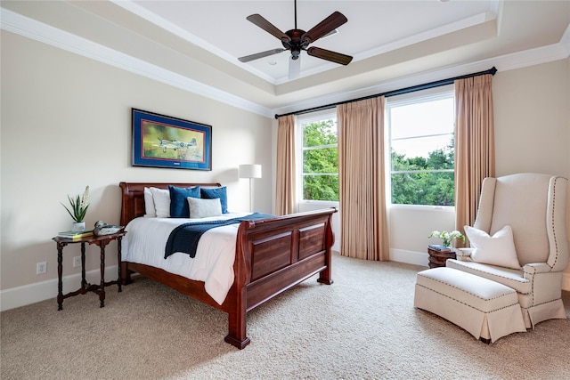 6511 Mimosa Ln, Dallas, TX 75230 - bedroom with a tray ceiling, light colored carpet, ornamental molding, baseboards, and a ceiling fan