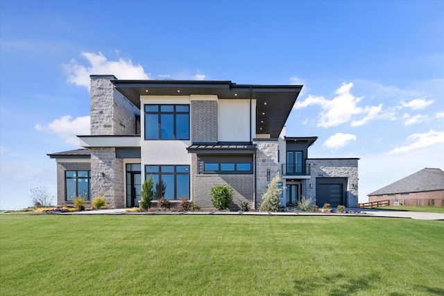 view of front of property with driveway, stone siding, a front lawn, and stucco siding