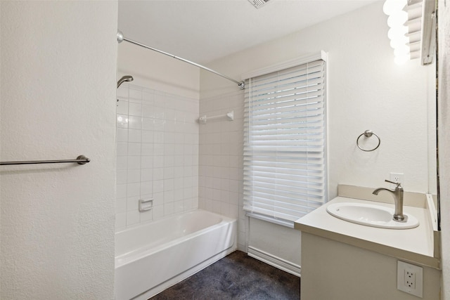 bathroom with vanity and tub / shower combination