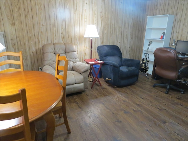 interior space featuring wooden walls and hardwood / wood-style floors