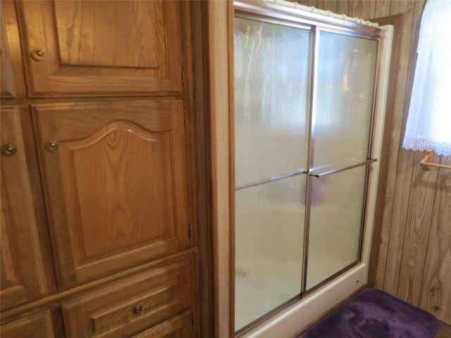 bathroom with an enclosed shower