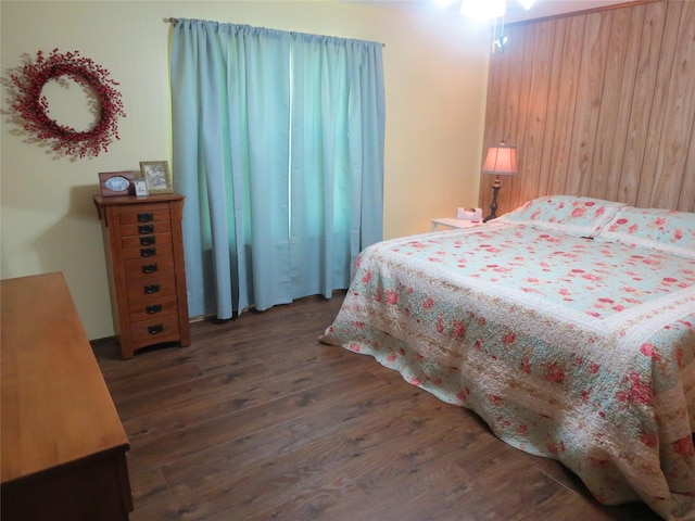 bedroom featuring wood finished floors
