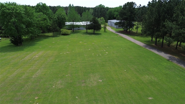 surrounding community featuring a lawn