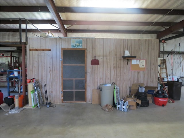 garage with wood walls