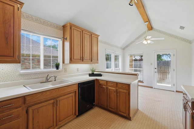 kitchen with brown cabinets, light countertops, a sink, a peninsula, and black dishwasher
