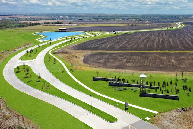 surrounding community with a water view