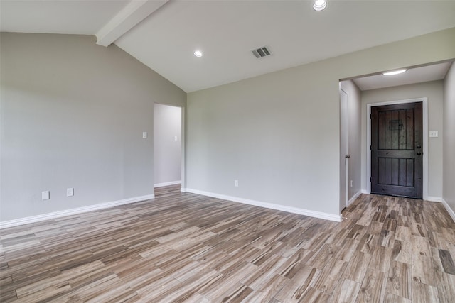 spare room featuring baseboards, light wood-style flooring, visible vents, and recessed lighting