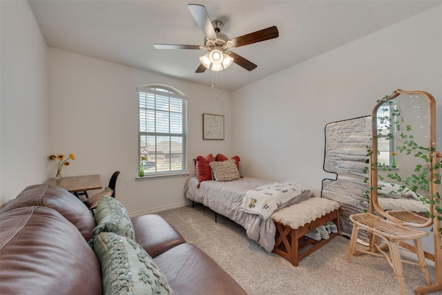 bedroom featuring baseboards, carpet, and a ceiling fan
