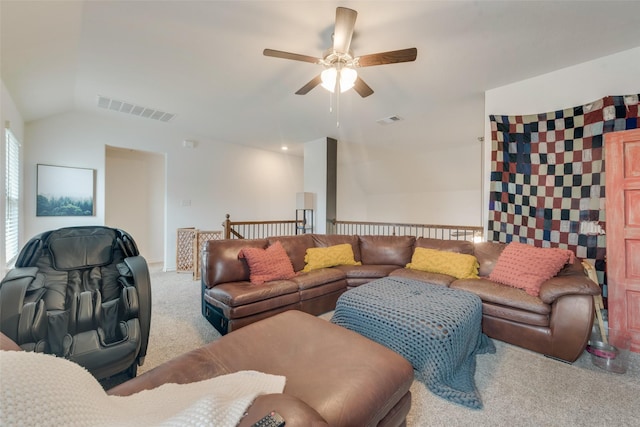 living area featuring carpet flooring, ceiling fan, visible vents, and vaulted ceiling