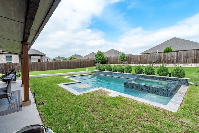 view of pool with a fenced in pool, a fenced backyard, an in ground hot tub, and a yard