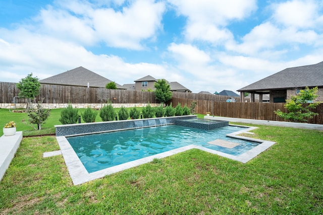 view of swimming pool featuring a lawn, a fenced backyard, and a pool with connected hot tub