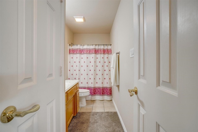 11632 Virginia Way Ct, Fort Worth, TX 76008 - bathroom with toilet, tile patterned floors, vanity, curtained shower, and baseboards