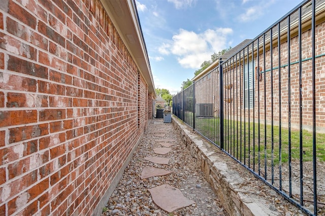11632 Virginia Way Ct, Fort Worth, TX 76008 - view of home's exterior featuring fence and brick siding