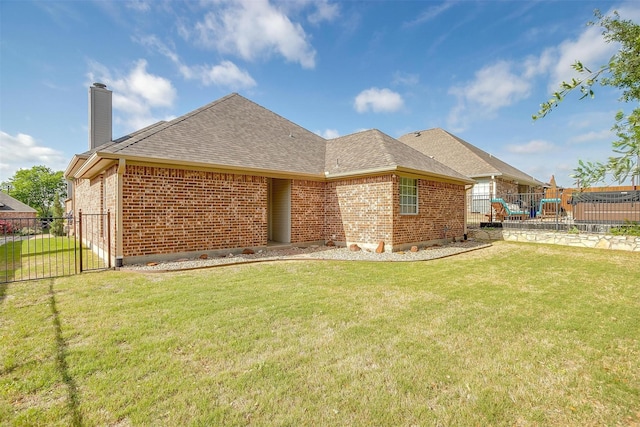 11632 Virginia Way Ct, Fort Worth, TX 76008 - rear view of property with brick siding, a yard, roof with shingles, and fence