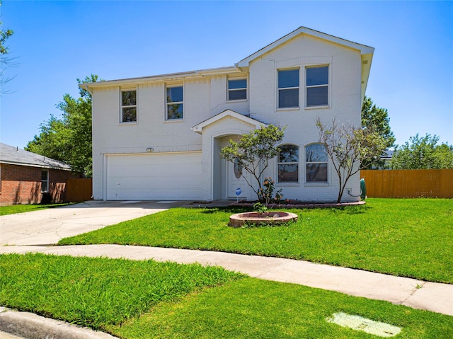 920 Kendall Dr, Arlington, TX 76001 - traditional-style home featuring an attached garage and driveway