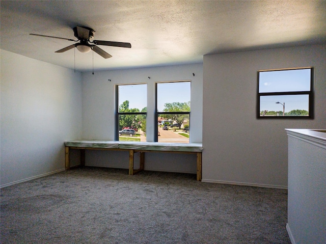 920 Kendall Dr, Arlington, TX 76001 - spare room with carpet, baseboards, and ceiling fan