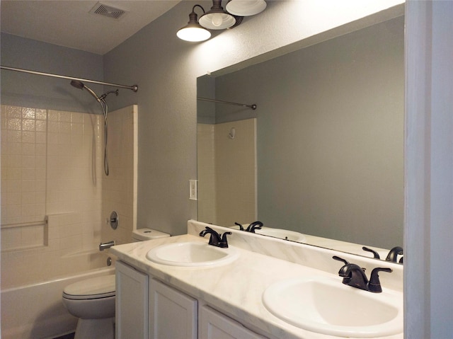 920 Kendall Dr, Arlington, TX 76001 - full bath with toilet, double vanity, and shower / bathtub combination