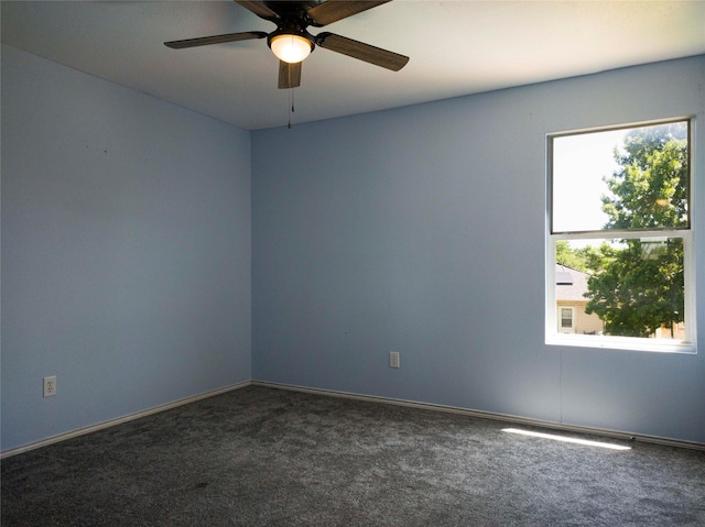 920 Kendall Dr, Arlington, TX 76001 - carpeted empty room with ceiling fan and baseboards