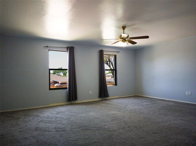 920 Kendall Dr, Arlington, TX 76001 - carpeted empty room with a ceiling fan and baseboards