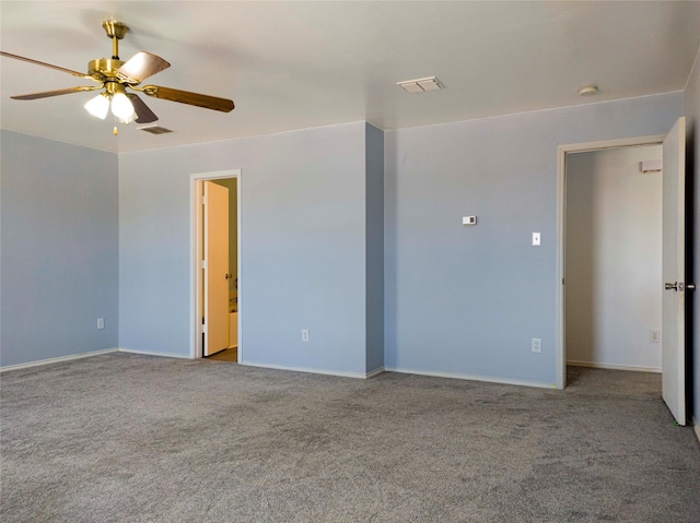 920 Kendall Dr, Arlington, TX 76001 - empty room with carpet, a ceiling fan, and baseboards