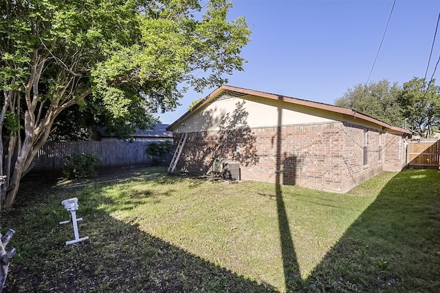exterior space featuring a fenced backyard