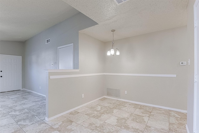 unfurnished room featuring an inviting chandelier, baseboards, visible vents, and a textured ceiling