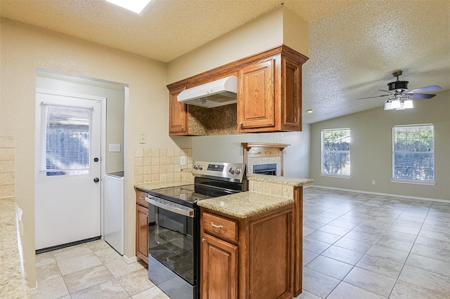 kitchen with stainless steel electric range oven, a ceiling fan, under cabinet range hood, and a textured ceiling