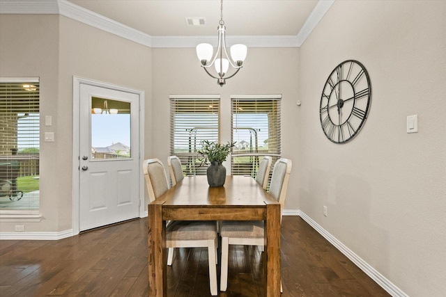 7401 Green Mesa Rd, Ponder, TX 76259 - dining area with dark wood-type flooring, healthy amount of natural light, baseboards, and crown molding