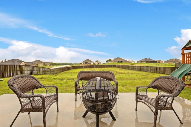 7401 Green Mesa Rd, Ponder, TX 76259 - view of patio / terrace featuring a fire pit, a playground, and a residential view