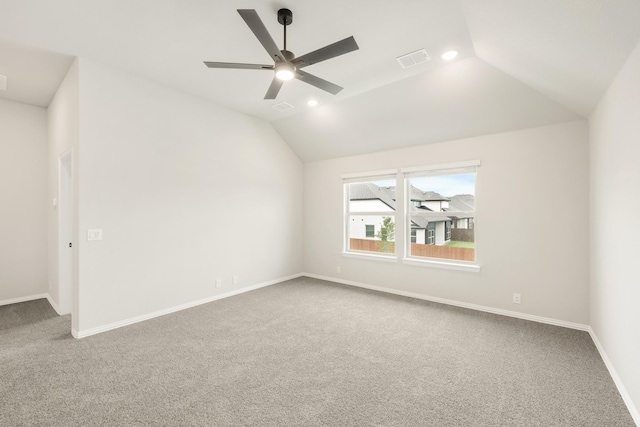 2708 Creekhollow Ct, Denton, TX 76226 - spare room featuring carpet flooring, vaulted ceiling, a ceiling fan, and recessed lighting