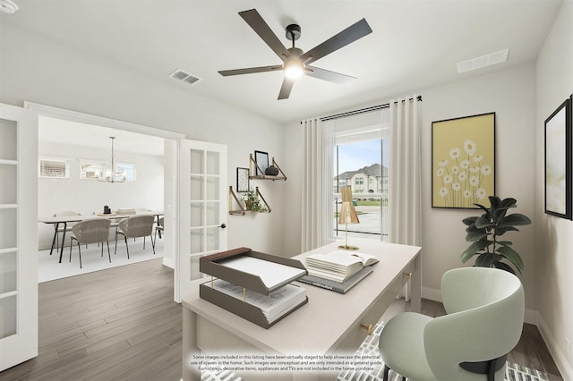 2708 Creekhollow Ct, Denton, TX 76226 - office area with a chandelier, wood finished floors, ceiling fan, and french doors
