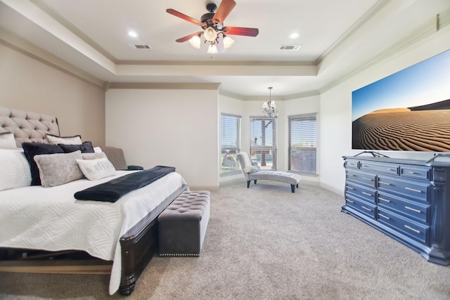 bedroom featuring crown molding, carpet, a raised ceiling, and baseboards