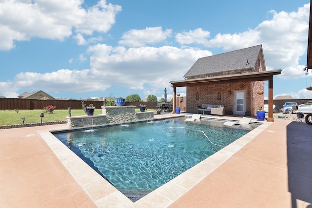 view of pool featuring a patio, fence, a yard, and a fenced in pool